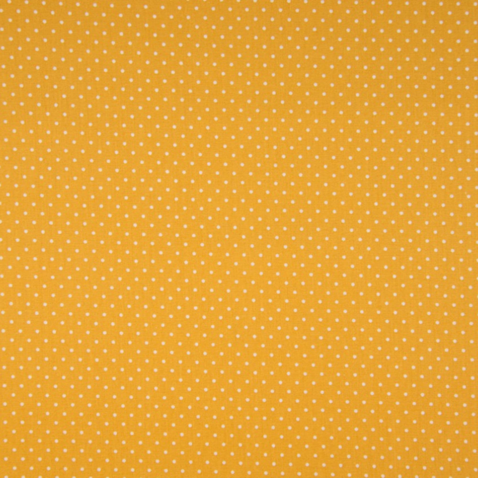 Tela algodón estampada topos blancos fondo ocre — imagen 1