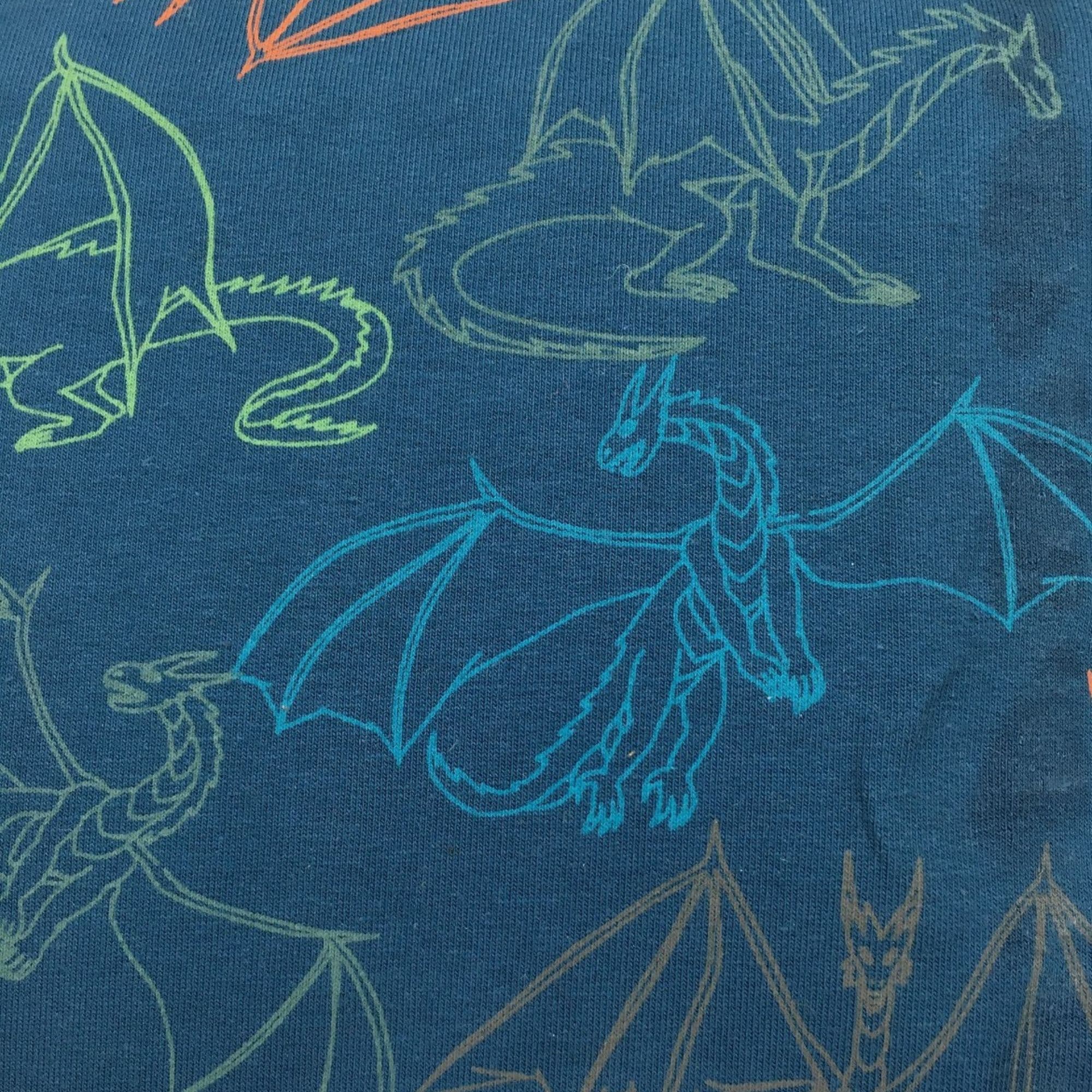 French terry estampado dragones fondo azul — imagen 1