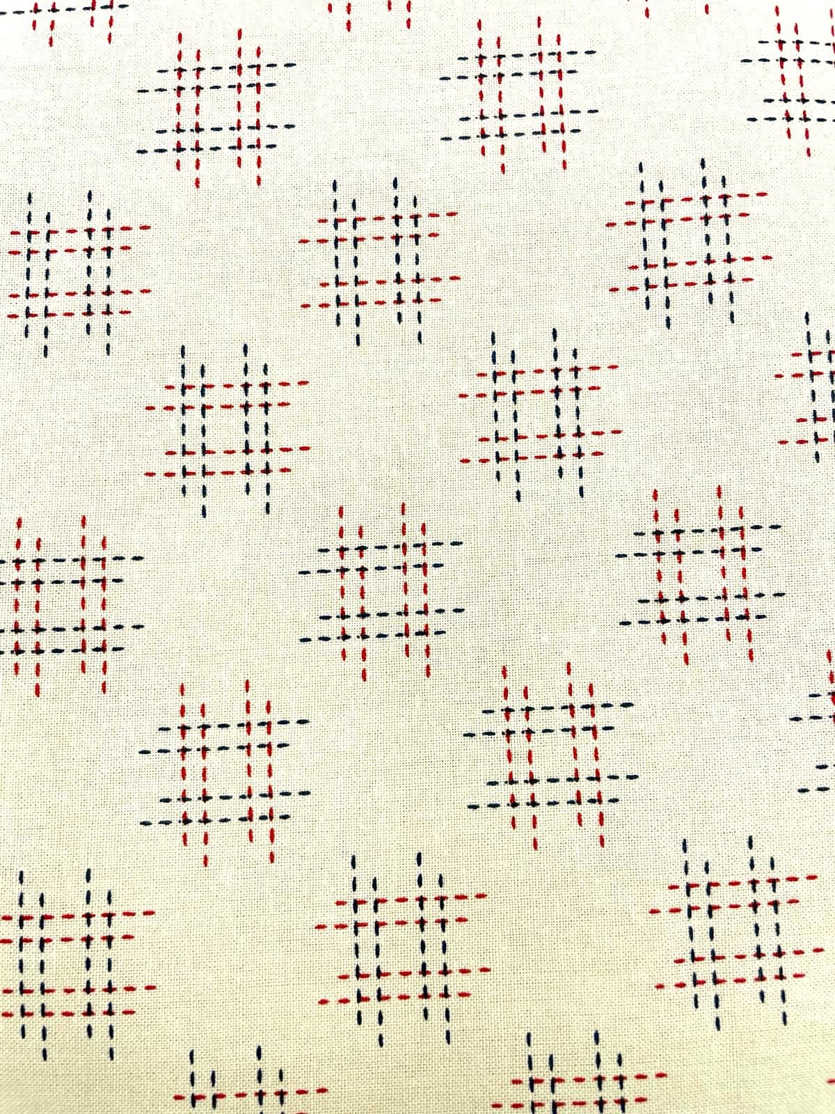 Tela algodón japonesa fondo beige motivos azules y rojos — imagen 1